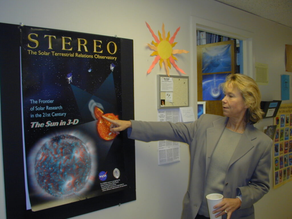 Janet Luhman and poster