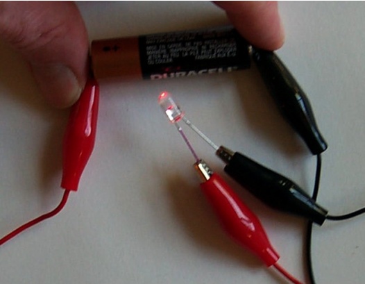 LED connected to a battery  with wires with alligator clip ends